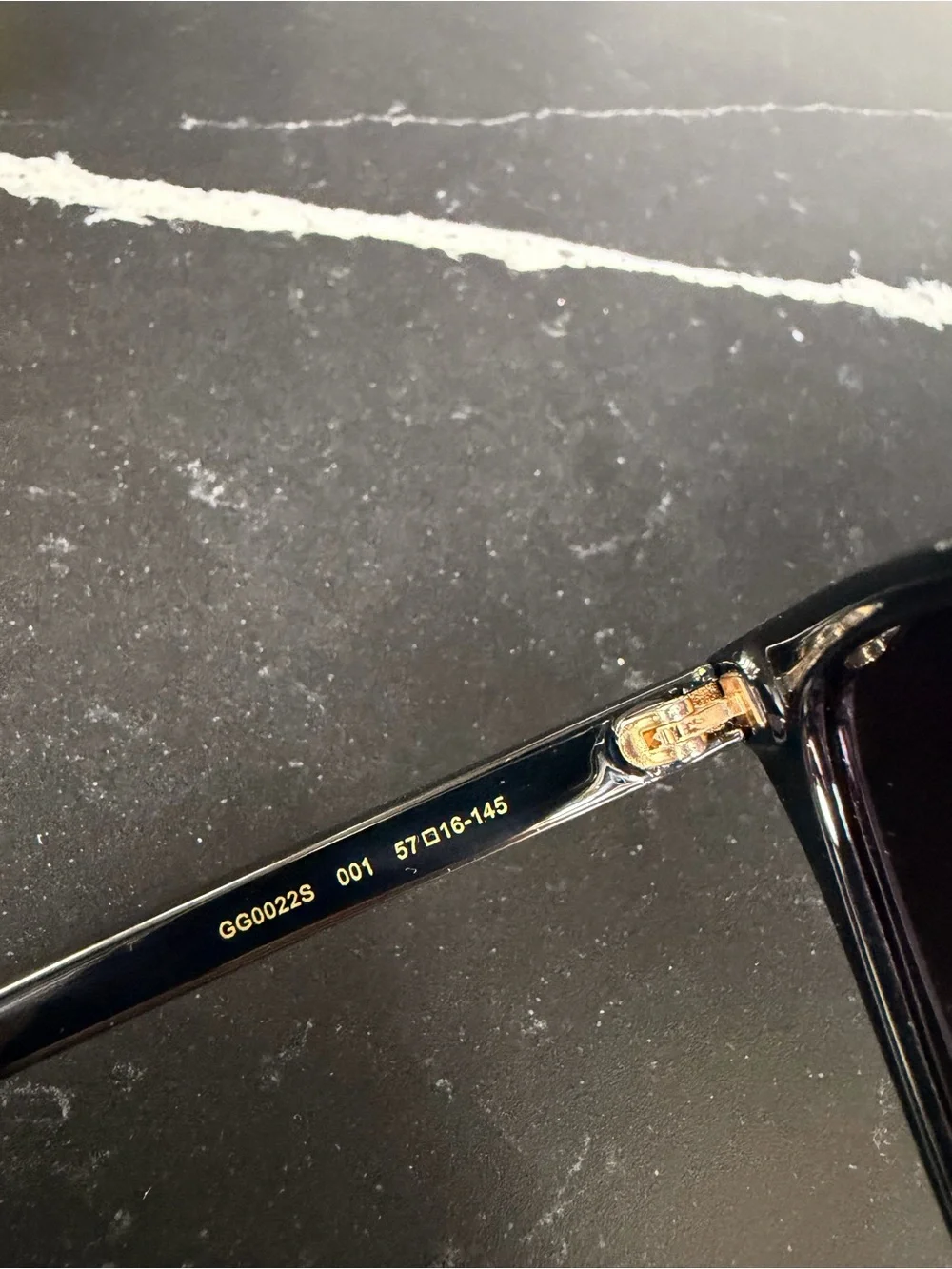 Gucci Black Frame Sunglasses with Gradient Purple Lenses